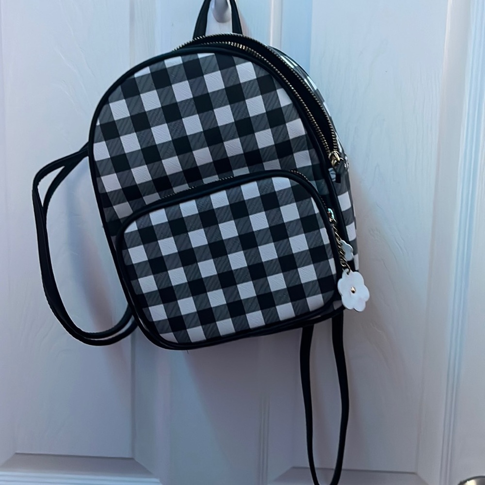 Claire’s checkered mini backpack